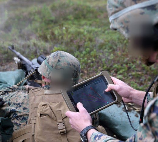 Rugged tablet running a tactical map application, used in the field
