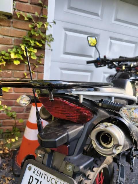 Mesh node with antenna mounted on the rear of a motorcycle