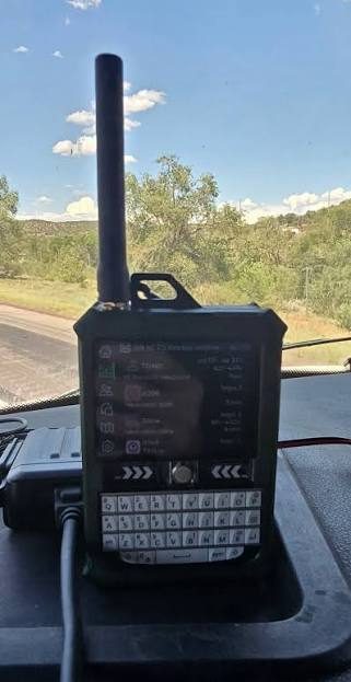 Handheld mesh node with keyboard mounted on a vehicle dashboard